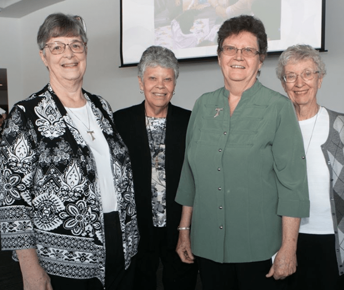 a photo of Sisters Althea Anne Spencer, Mary Parks, Janet Gardner, and Maria Kruszewski 
Photo Credit: John Colombo 